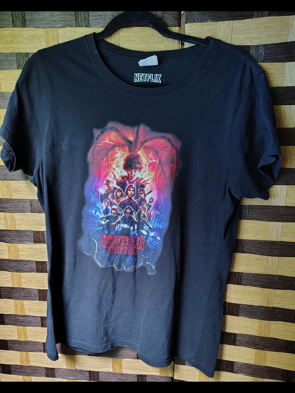 Netflix Black Short-Sleeve Stranger Things Graphic Tee with Red & Blue Artwork